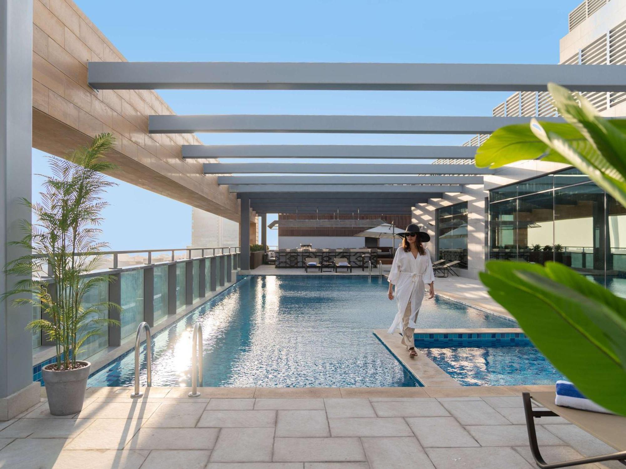 Swissotel Living Jeddah Exterior photo The swimming pool at the hotel